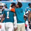 Head coach Mike McDaniel of the Miami Dolphins embraces Tua Tagovailoa