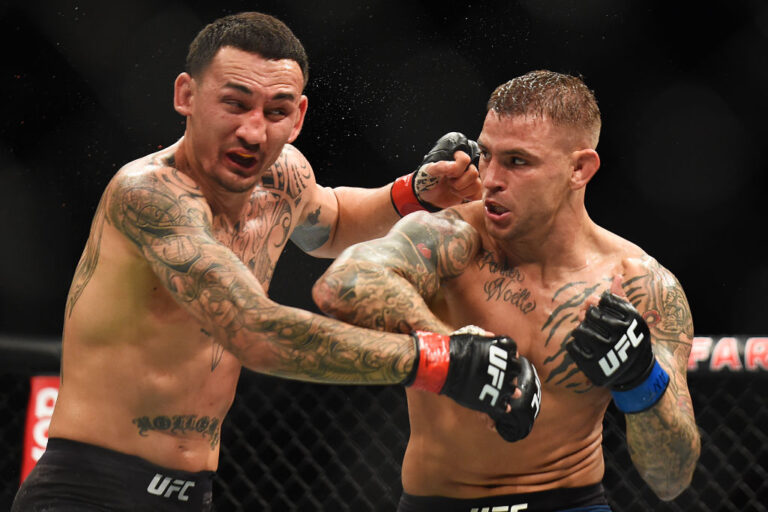 Dustin Poirier punches Max Holloway