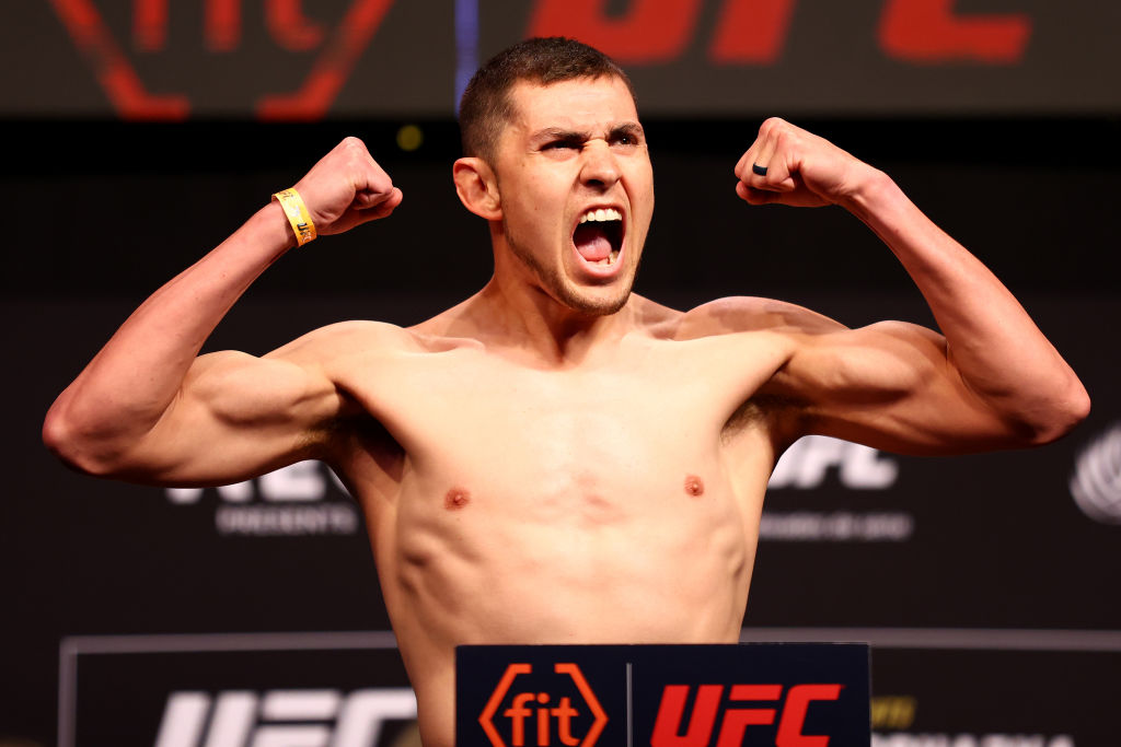 Steve Garcia of the United States poses on the scale ahead of his lightweight bout